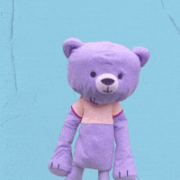 Video gif. Teddy Too-Big, a purple mascot bear, does a two-step dance. Text, "Going up on a Tuesday."