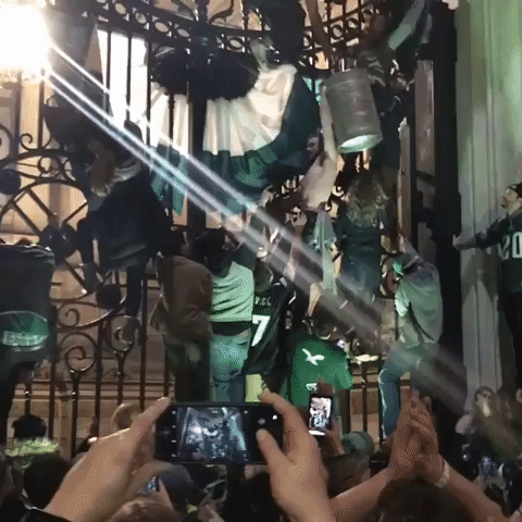Eagles Fans Scale Philadelphia City Hall Gates With Beer Kegs