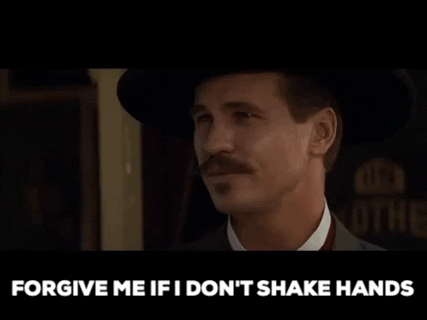 mspete giphygifmaker shakehands shake tombstone docholliday movie forgive forgiveme GIF