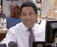 The Office gif. Oscar Nuñez as Oscar tilts his head to the side with a questioning look on his face.
