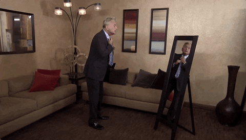 tying suit and tie GIF by Wheel of Fortune