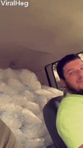 Coworker Slams On Brakes Causing Ice Bags To Fall GIF by ViralHog