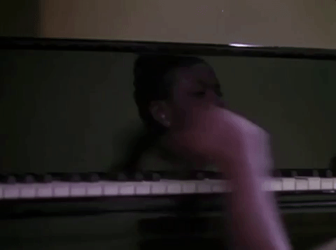 classic film piano GIF