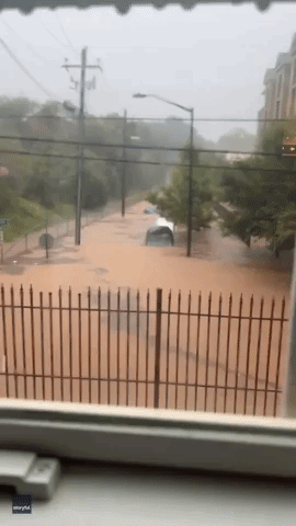 Cars Submerged Amid Severe Flooding Near Atlanta College Campus