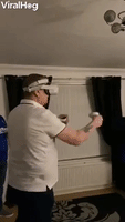 Uncle Trying VR Boxing Ends up with a Broken Lamp and Table
