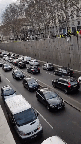 Motorists Honk for Protesters Lining Roadway in Lyon