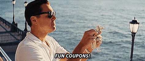 Movie gif. Leonardo DiCaprio as Jordan Belfort in Wolf of Wall Street stands over a pier flicking dollar bills down while saying, "Fun coupons!" which appears as text.