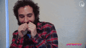Video gif. Jay Weingarten and Eric Rahill of Eternal Family laugh and giggle together, Jay covering his mouth in gleeful shock. Text, "LOL."