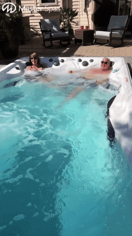 masterspas summer couple pool dunk GIF
