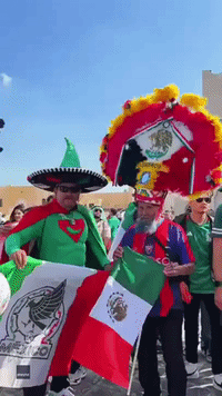 Mexico Fans Bring Trademark Color to Doha