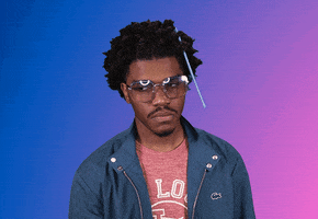 Celebrity gif. Smino takes a deep breath and sighs, shaking his head. He tosses a hand up in disappointment and walks away.
