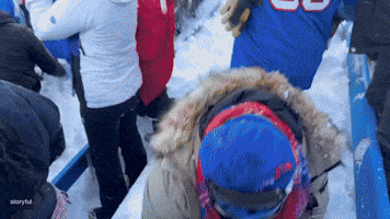 Buffalo Bill Fans Embrace Snow as They Celebrate Victory