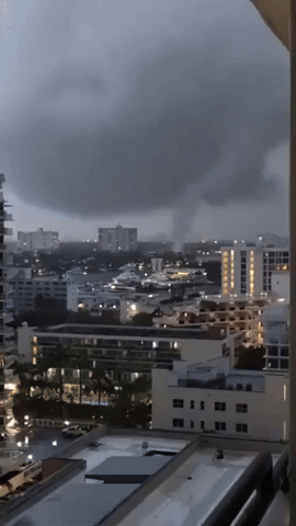 Likely Tornado Downs Power Lines as it Rips Through Fort Lauderdale