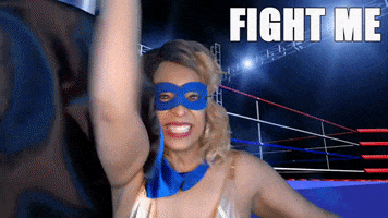 ComedianHollyLogan mask boxing hero fighting GIF