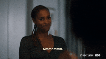 TV gif. Actress Issa Rae of Insecure emphatically nods her head with a straight smile. Text, "Mmmhmmm."