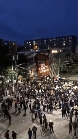 'We Can't Breathe' Projected Onto Wall as Protesters Gather in Seattle