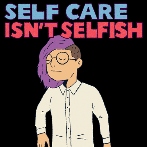 Digital art gif. Animation of a cartoon person with purple hair and an undercut hugs their arms tightly around themselves, their eyes closed peacefully. Blue and red text reads, "Self care isn't selfish," everything against a black background.