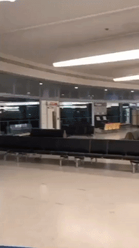 Empty Gatwick Airport Greets Traveler as Coronavirus Cases in UK Rise