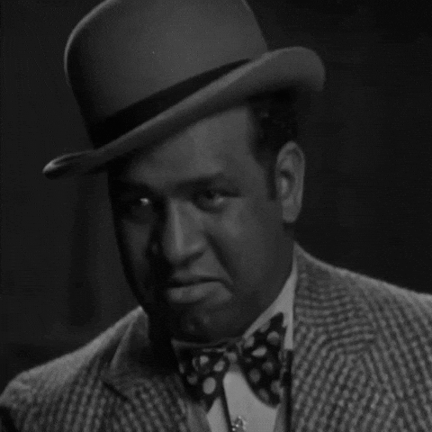 Wins_and_Lessons yes black and white wink nod GIF