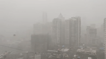 Heavy Monsoon Rain Decreases Visibility in Mumbai