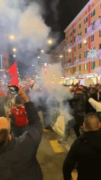 Fans in Milan Celebrate Morocco's World Cup Win Over Spain