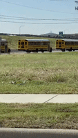 School Buses Line Up Near Dallas-Area High School Following Shooting