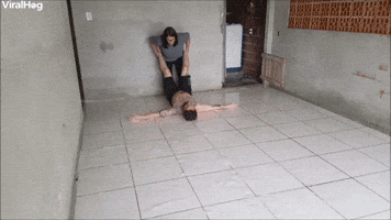 Mom Uses Son as a Squeegee to Wash the Garage