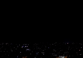 Explosions From IDF Airstrikes Flash in Gaza Night Sky