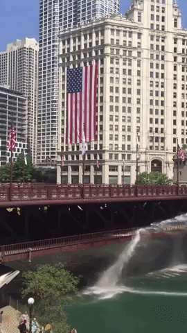 Chicago Firefighters Hose Down Steel Bridge During Heat Wave