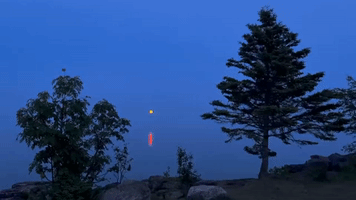 Moon Rises Over Lake Superior Ahead of July Supermoon Event