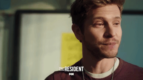 the resident smile GIF