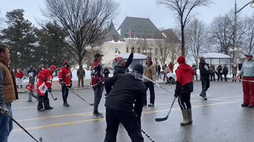 Protesters Against Vaccine Mandate Play Hockey Near Parliament Hill in Ottawa