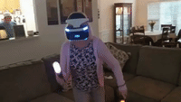 Enthusiastic Grandparents Play Virtual Reality Video Game