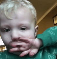 Young Boy Doesn't Like His New Beard