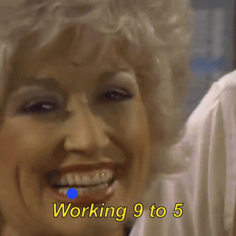 Music video gif. Scenes from Dolly Parton’s 9 to 5 music video play as a blue bubble bounces over the lyrics that are displayed below. First, we see Dolly singing followed by several shots of diverse women commuting to work. Text, Working 9 to 5, what a way to make a livin’. Voting on company time ‘cause our freedoms ain’t a given.”