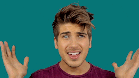 Celebrity gif. Joey Graceffa raises his hands and tilts his head to the side as he says to us, "thank you!" which appears as text.
