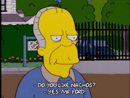 homer simpson laughing GIF