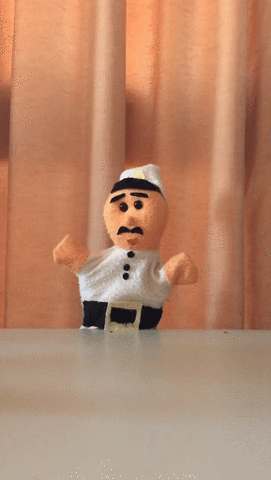 puppet waving GIF