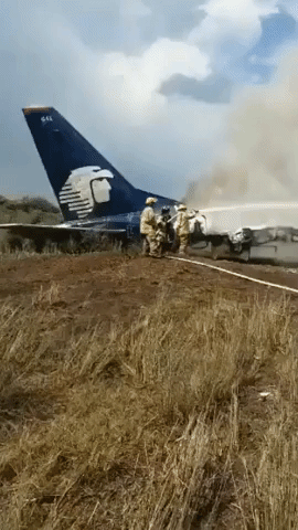 Firefighters Tackle Burning Aeromexico Plane After Crash in Durango, Mexico