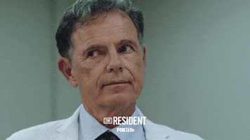 the resident smile GIF
