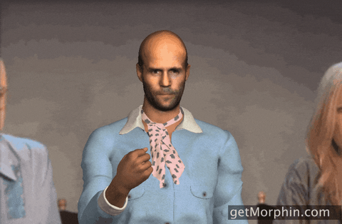 Digital art gif. A Jason Statham avatar wears a powder blue jacket and neckerchief as he looks blankly at us and tosses gold confetti into the air. 