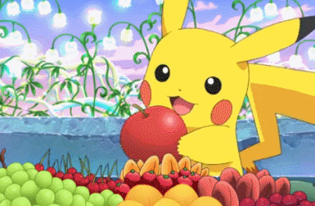 Anime gif. Pikachu from the Pokémon anime stands in front of a table full of fruits. Pikachu holds a red apple and stuffs the whole thing into his mouth.