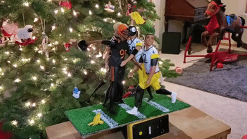 Family's Festive Football Ornament