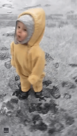 This Kid Was Amazed and Intrigued by His First Encounter With Snow