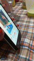 Granddaughter's Heartwarming Tech Tutorial With Grandpa Goes Viral