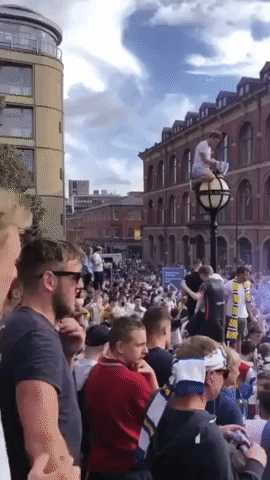 'Pump it up, the Whites are Going Up!': Leeds United Fans Celebrate Title Win in City Centre