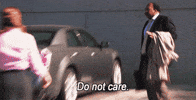 The Office gif. Hurriedly walking through the parking lot, Leslie David Baker as Stanley holds up his hand and keeps it moving while he says "do not care," which appears as text.