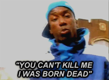 Music video gif. Big L raps, "You can't kill me, I was born dead," in the music video of "Put It On."