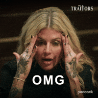 Sponsored gif. Traitors cast member Carolyn Wiger looks shocked and holds her hands up to her temples as she says, “O M G.”