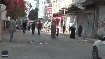 Building on Commercial Street in Gaza City Reduced to Rubble as Airstrikes Continue